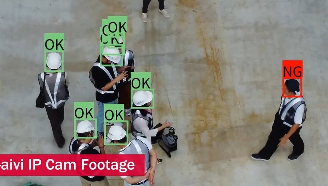 Remote monitoring of multiple construction workers using AR and AI, detecting hard hat compliance for safety enforcement.