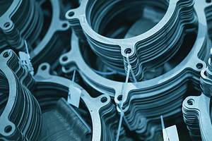 Metal gaskets for pipelines. Abstract industrial background toned in blue.