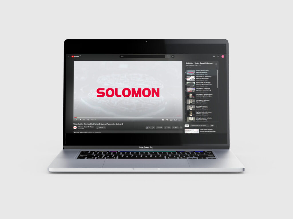 CGI rendering of an open laptop screen watching the Solomon AI and 3D Vision YouTube channel, representing videos.